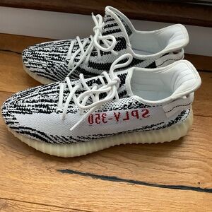 Excellent copy of Yeezys Boost. Mens never worn. Size 11